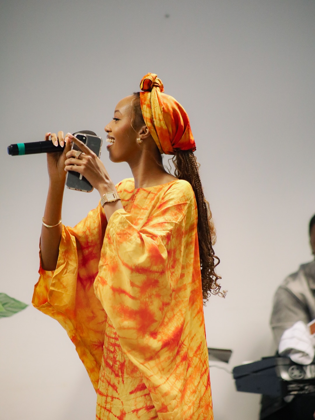 A woman singing during worship