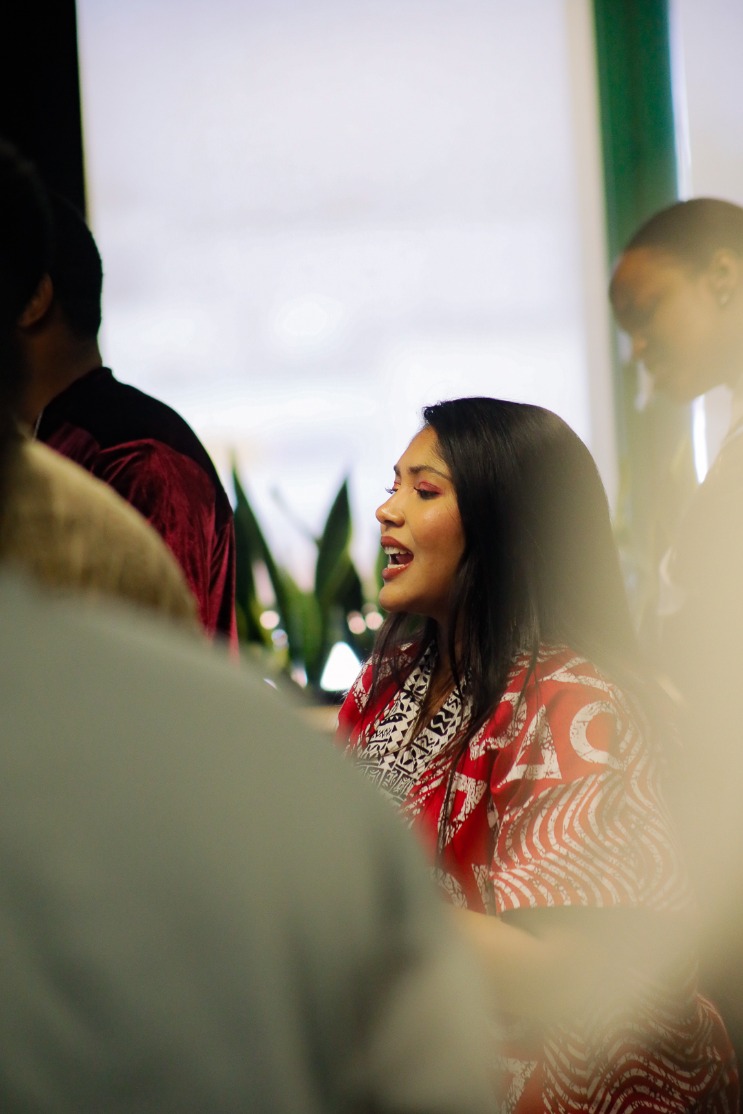 A woman singing during worship
